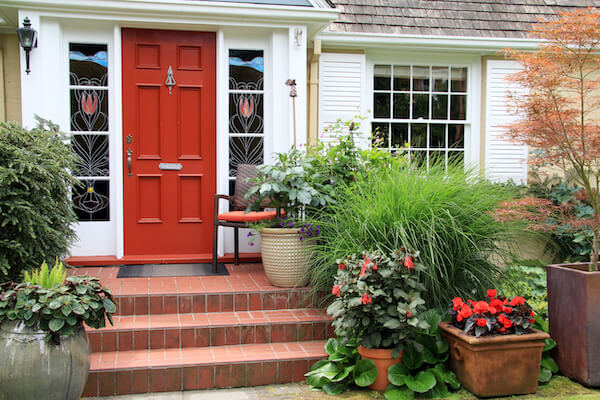 exterior view of house with a red front door