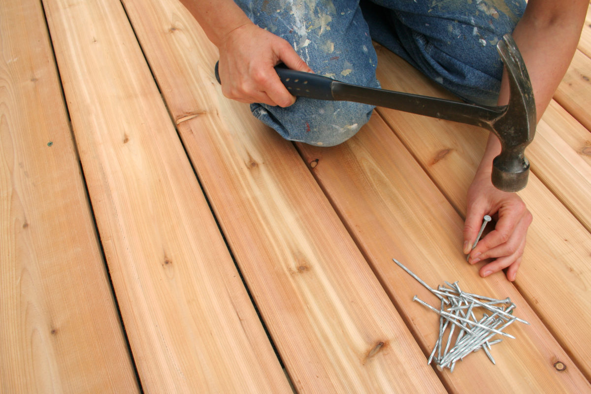 handyman fixing deck, handyman repairs deck