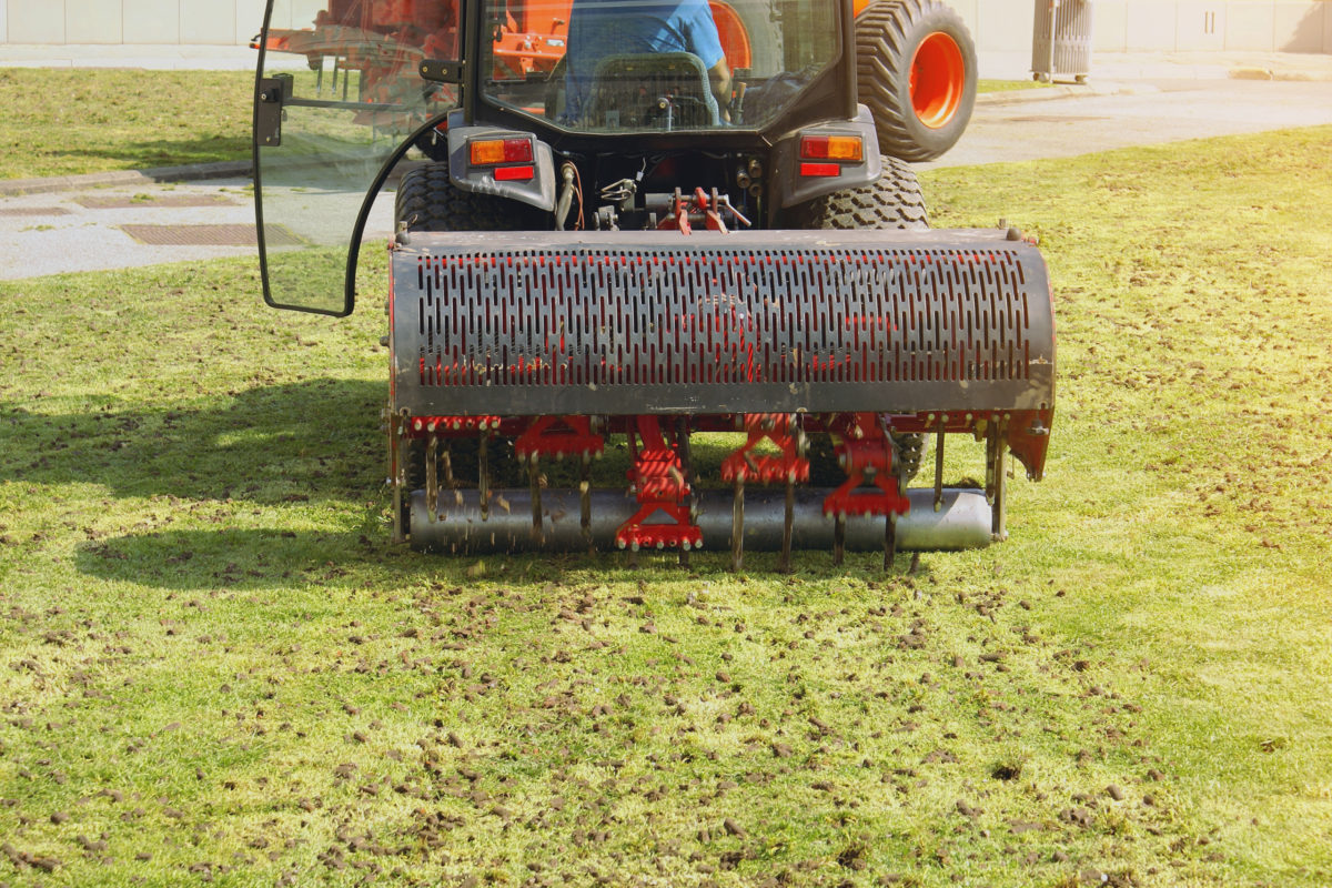 aerate lawn with special machine