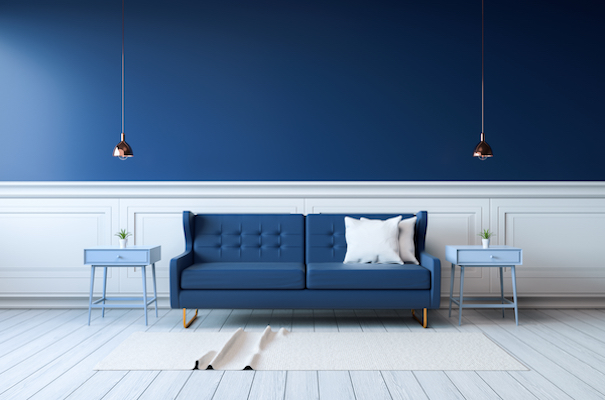 blue couch on a blue wall in classic blue pantone colour of the year