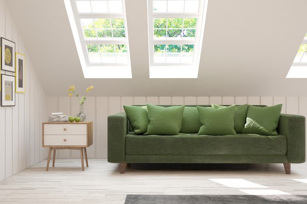 rearrange furniture green sofa