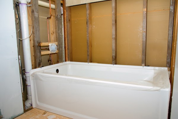 framing around bathtub during bathroom renovation