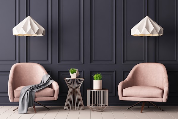 dark walls with light pink chairs colour pop