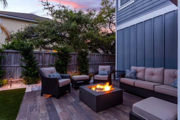 outdoor furniture surrounding firepit