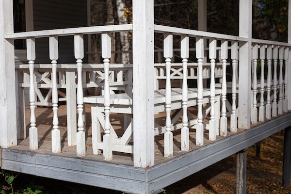 front porch of home with old railings