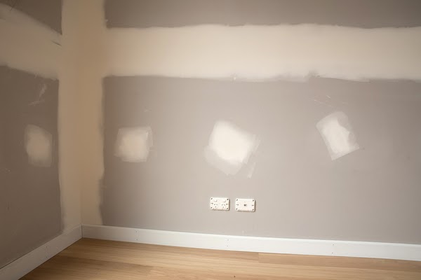 spot touching drywall with spackle