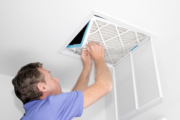 pro cleaning air ducts in home