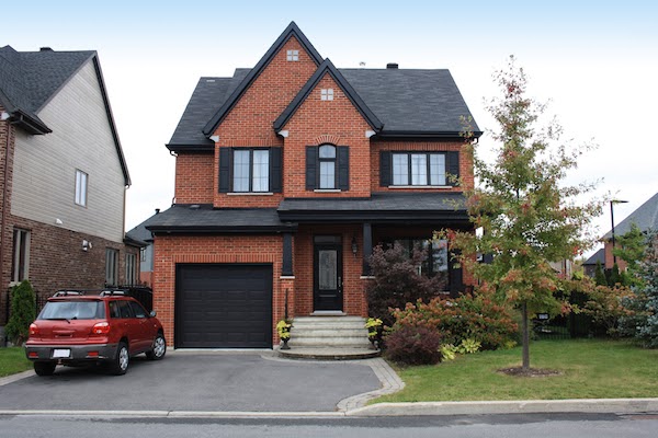 Canadian home with asphalt driveway