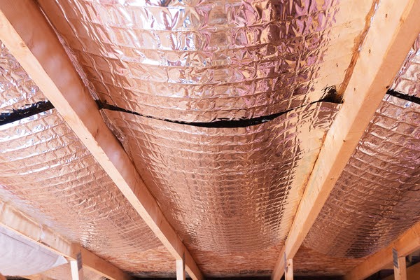 ceiling of attic with reflective barrier insulation