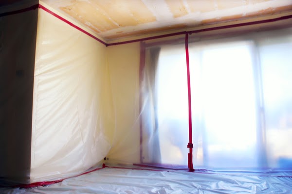 plastic sheeting hung in room
