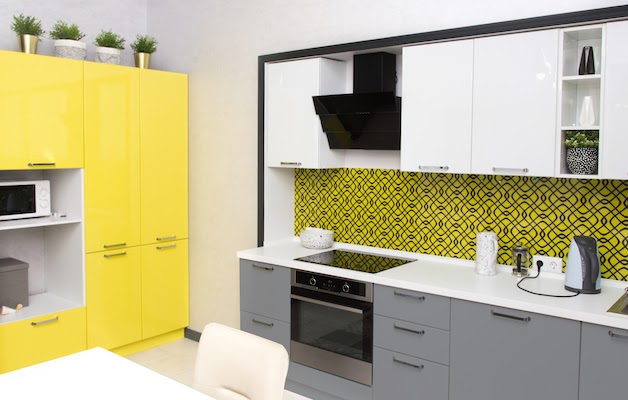 kitchen with yellow and grey cabinets