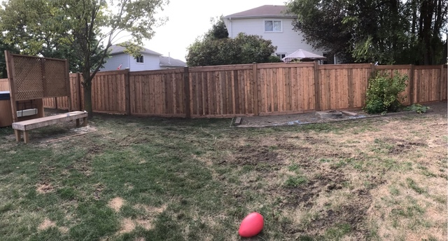 backyard property fence and hot tub privacy fence
