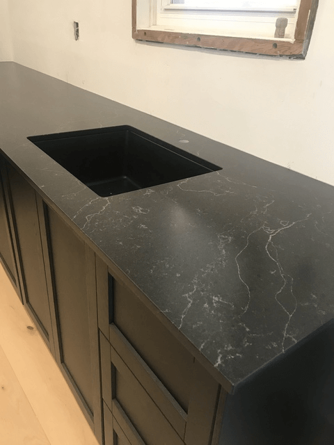 black kitchen countertop installation