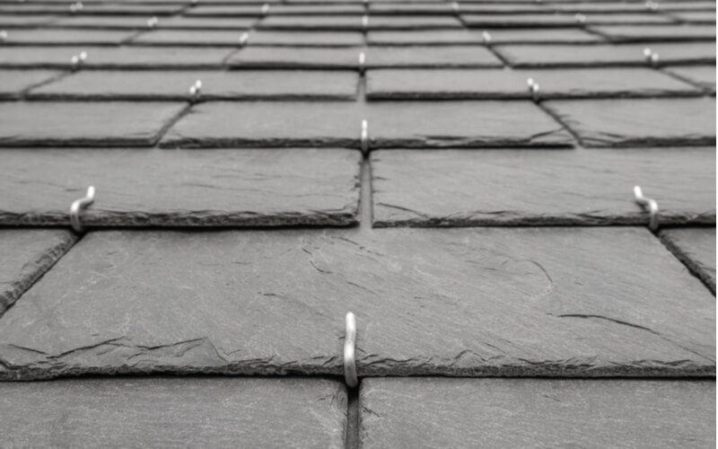 Background slates laid on roof close up rectangle double roofing