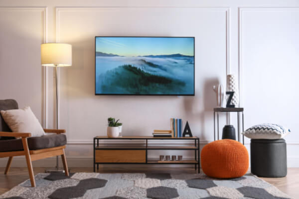 tv on wall photo frame family room