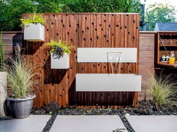 water fall fence wall with plants